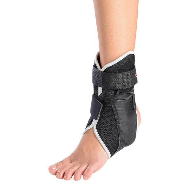 Total stability ankle brace with strap